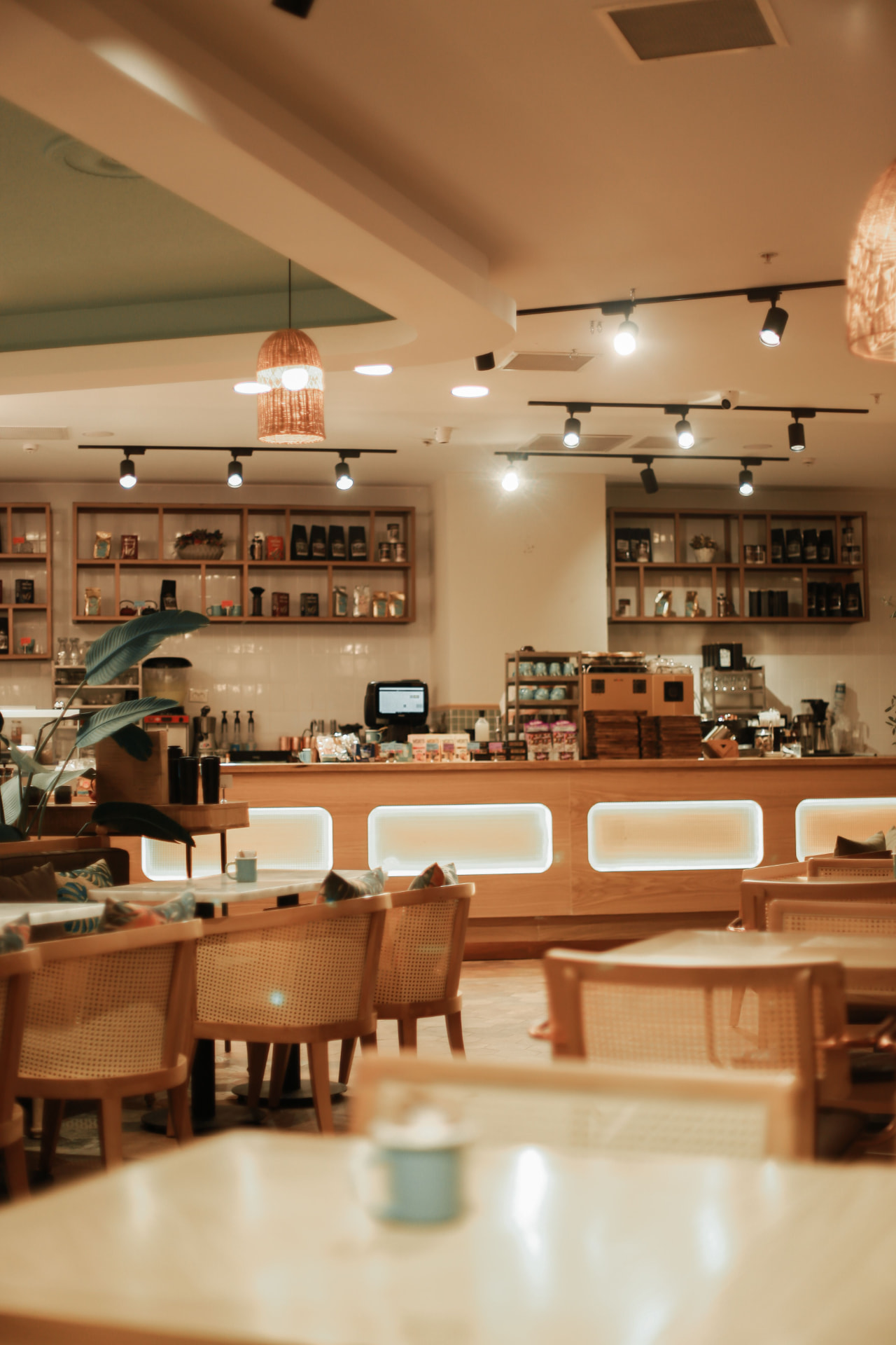 Café interior looking across the seating area to the counter