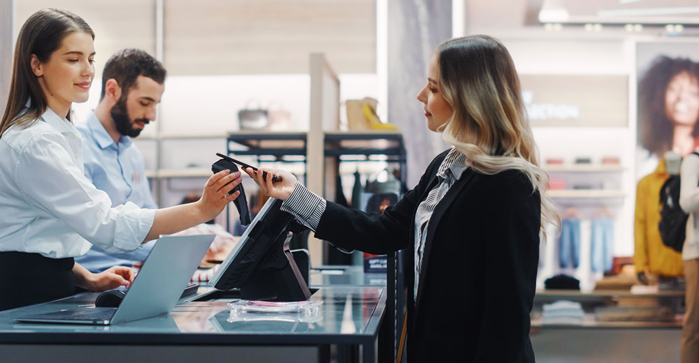 Customer making a card payment at a retail checkout